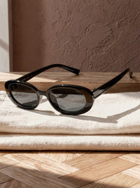 Lunettes de soleil ovales Bertille – Noir