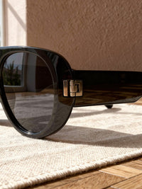 Lunettes de soleil ovales Sacha – Noir