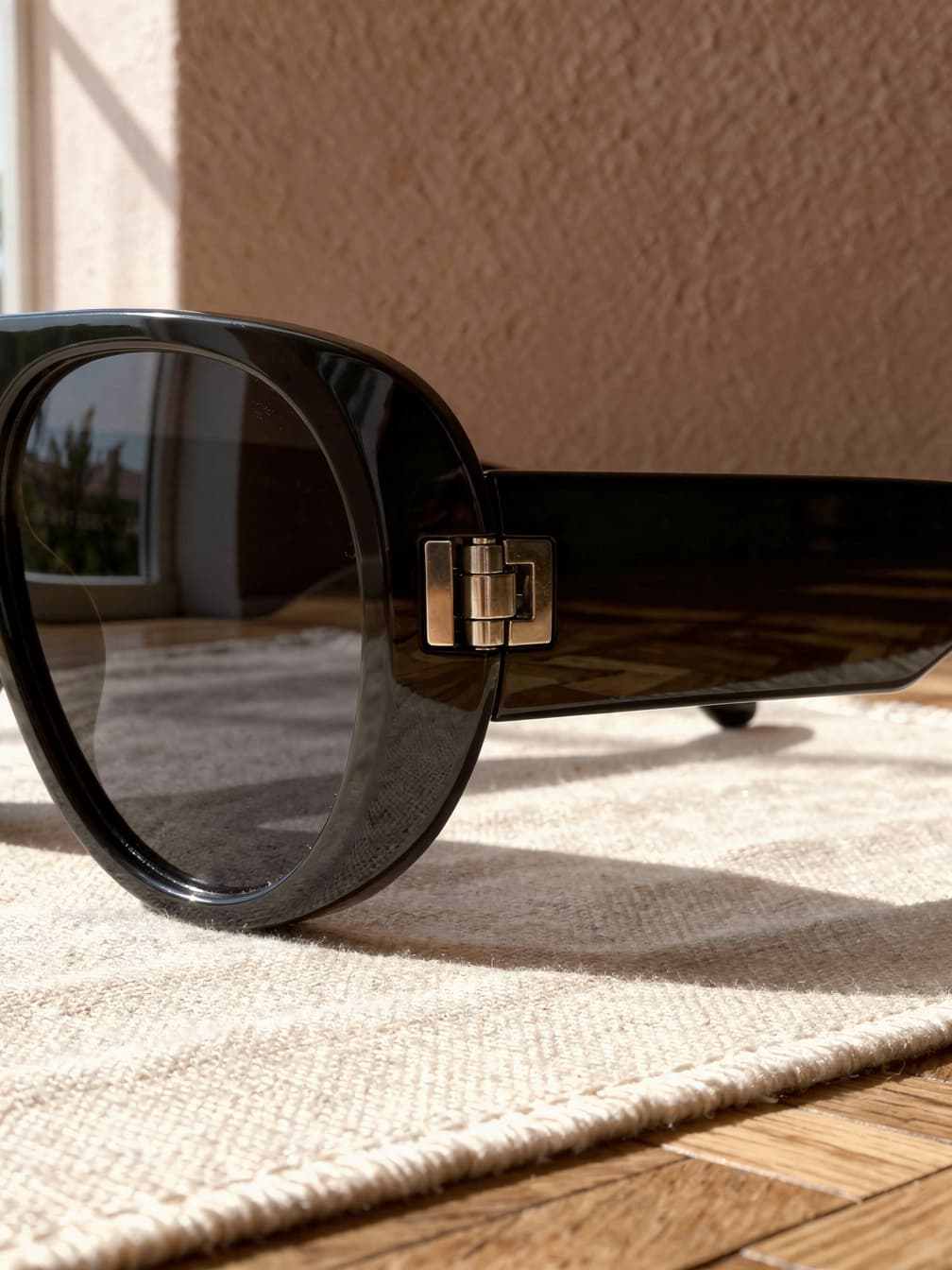 Lunettes de soleil ovales Sacha – Noir
